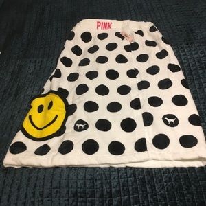 Pink adjustable velcro bath wrap towel.